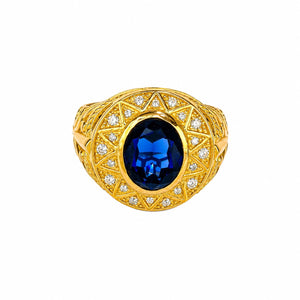 Anillo con piedra azul, en oro 18k