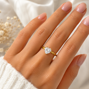 Solitario modelo love, en oro 18k