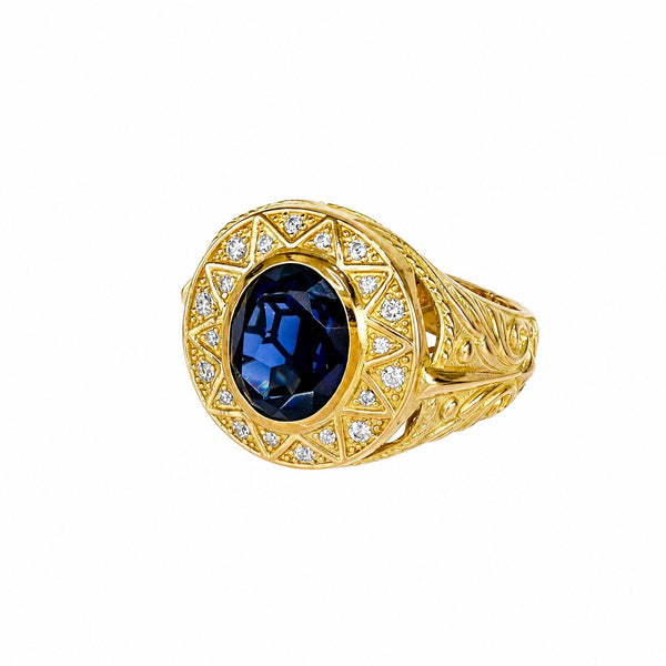 Anillo con piedra azul, en oro 18k