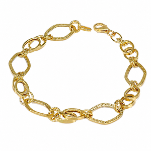 Pulsera tarra, en oro 18k.