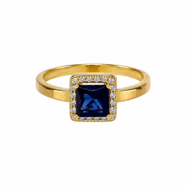 Solitario con piedra azul, en oro 18k